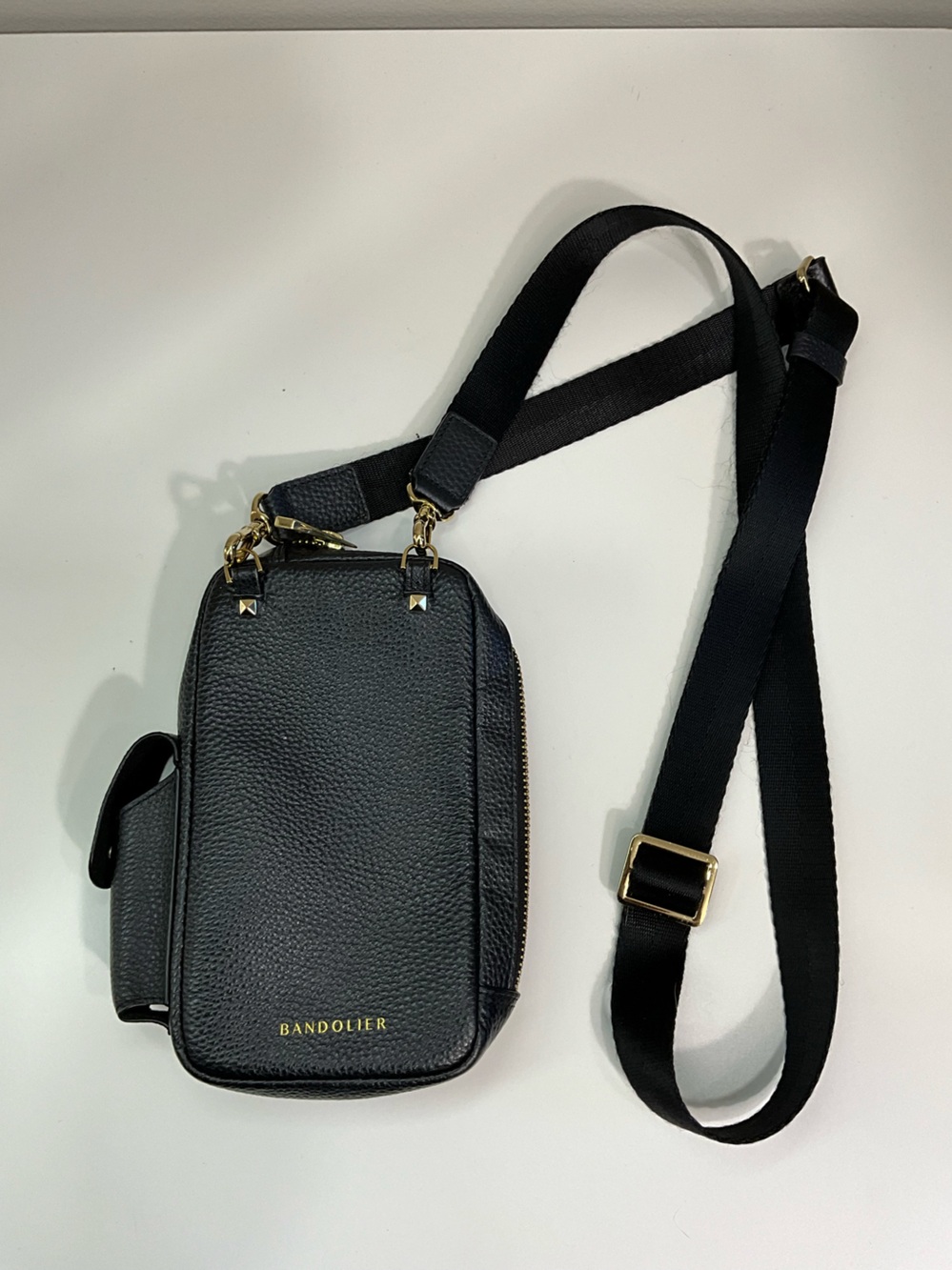 BANDOLIER Black Pebbled Leather Crossbody Phone Bag Gold Hardware Zip Top
